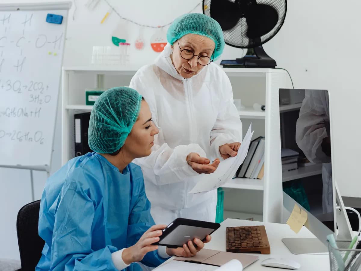 A food technologist checking results on a production site